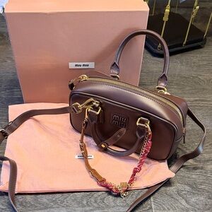 Miu Miu Dark Brown Crossbody Bag with Gold Accents